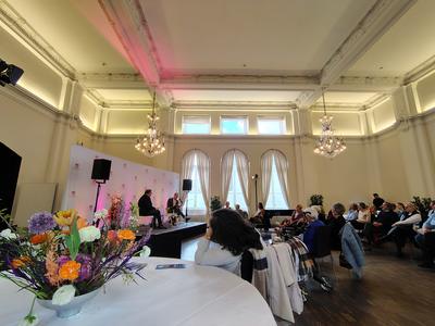 A salon at the Badischer Hof laid up for a spring reception, chandeliers and all