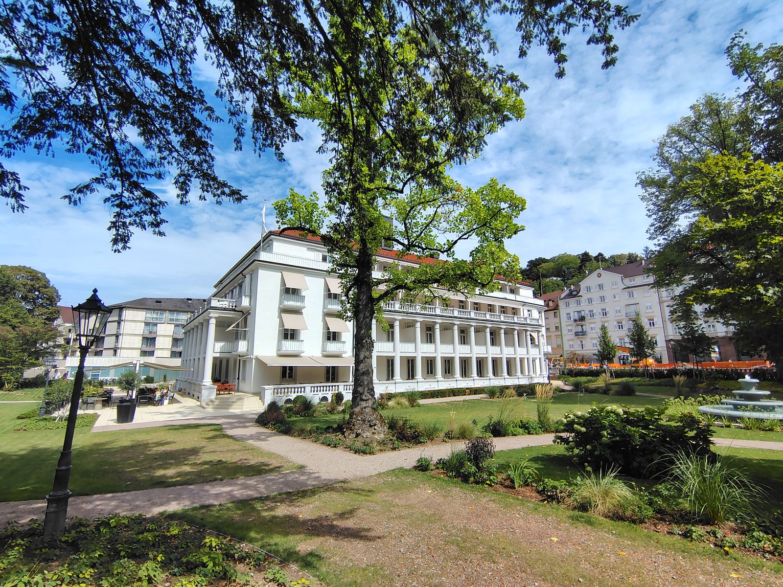 The Badischer Hof from under the plane trees in the park