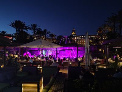 The Lopesan plaza lit up after dark, which is when the resort is at its best