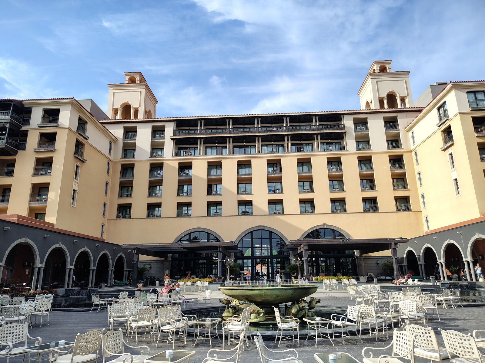 The courtyard and fountain at Lopesan Costa Meloneras, chairs out for the evening