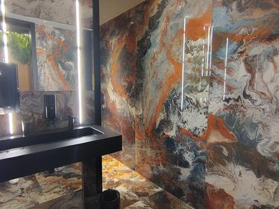 Bookmatched marble at Hotel Faro, a Lopesan Collection Hotel — the sort of detail that tells you where the budget went