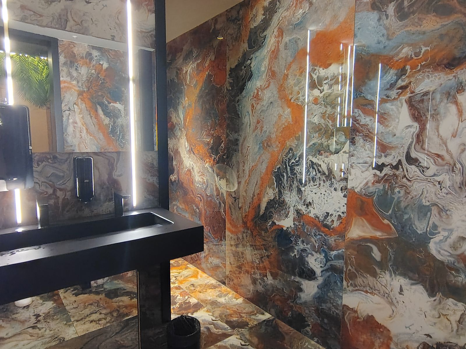 Bookmatched marble at Hotel Faro, a Lopesan Collection Hotel — the sort of detail that tells you where the budget went