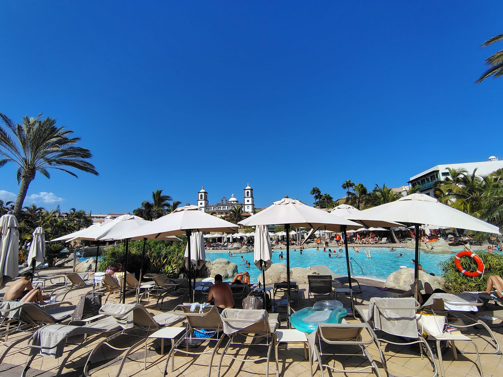 Loungers and parasols at Lopesan — the part of the price you either use or waste