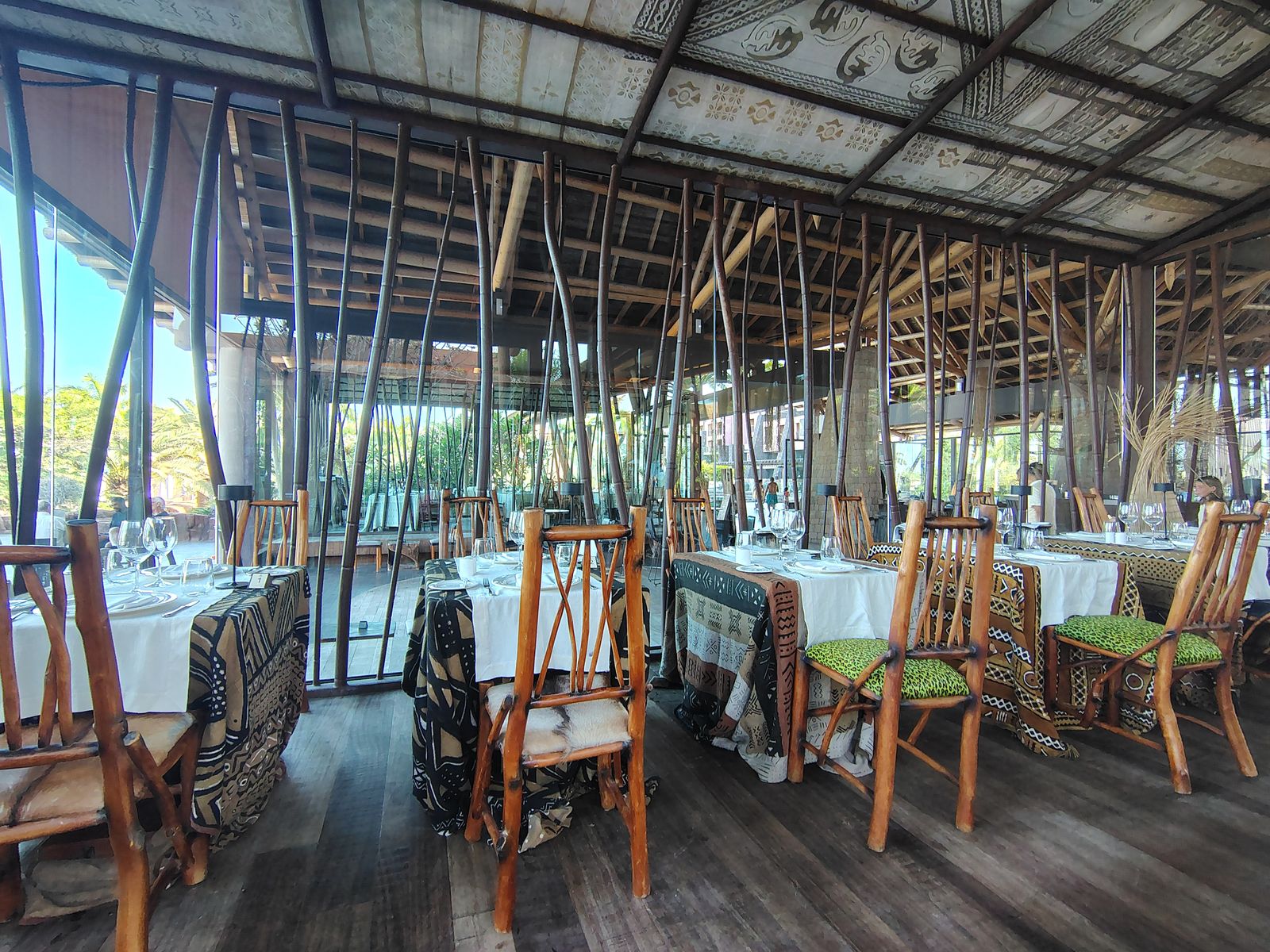The African-themed dining room at Lopesan Baobab, laid up under a painted ceiling