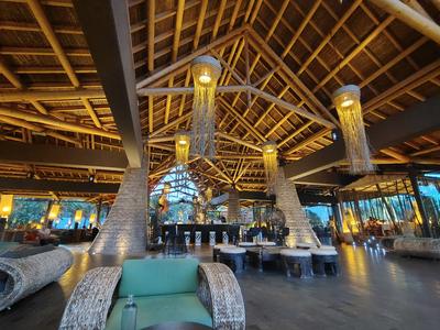 The Lopesan Baobab lobby under its thatched roof, four storeys of it