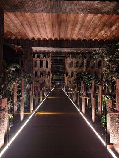 The causeway at Lopesan Baobab at night, lit along both edges