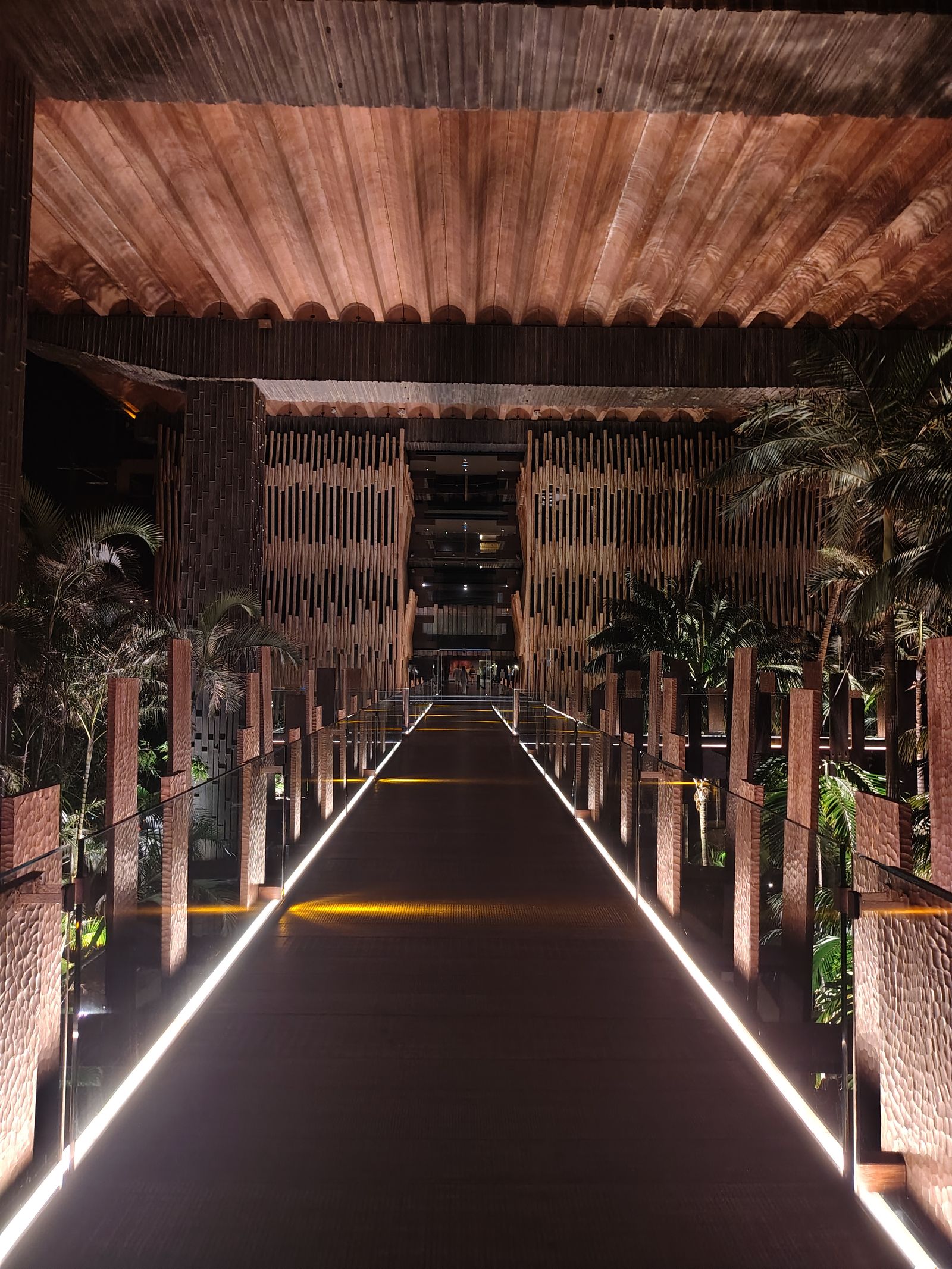 The causeway at Lopesan Baobab at night, lit along both edges