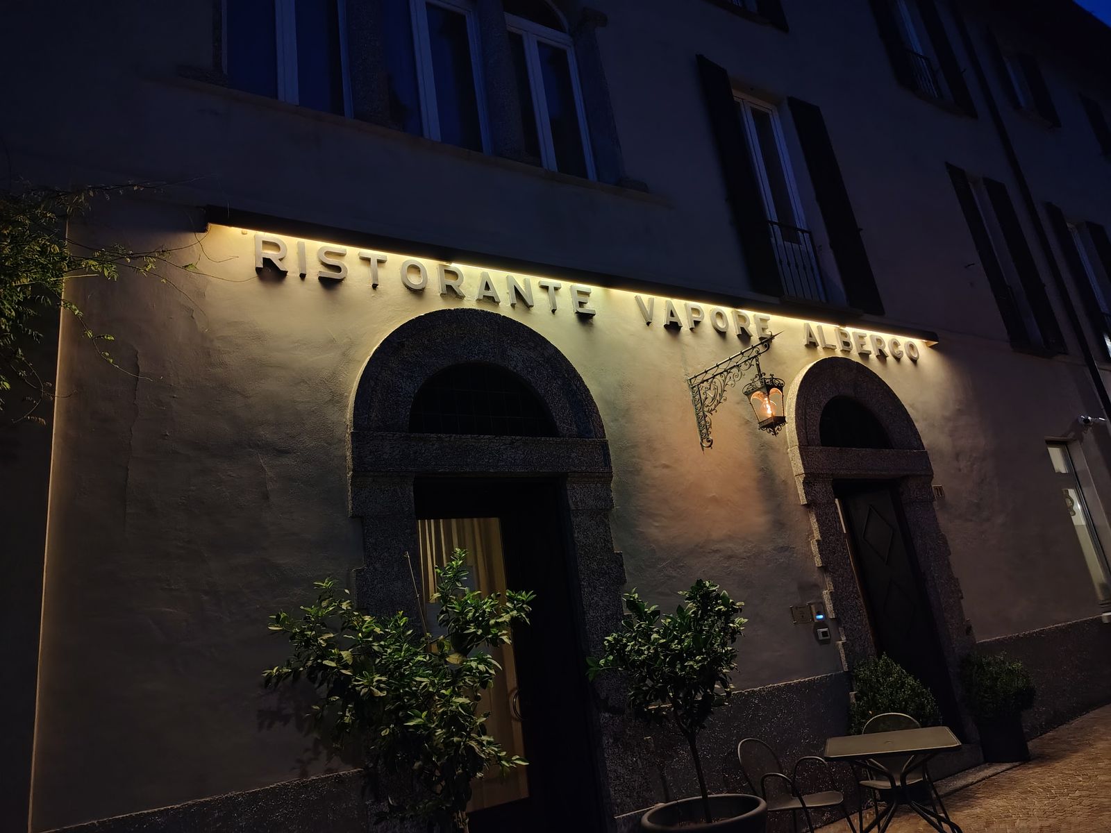 A village restaurant with its name cut into the stone