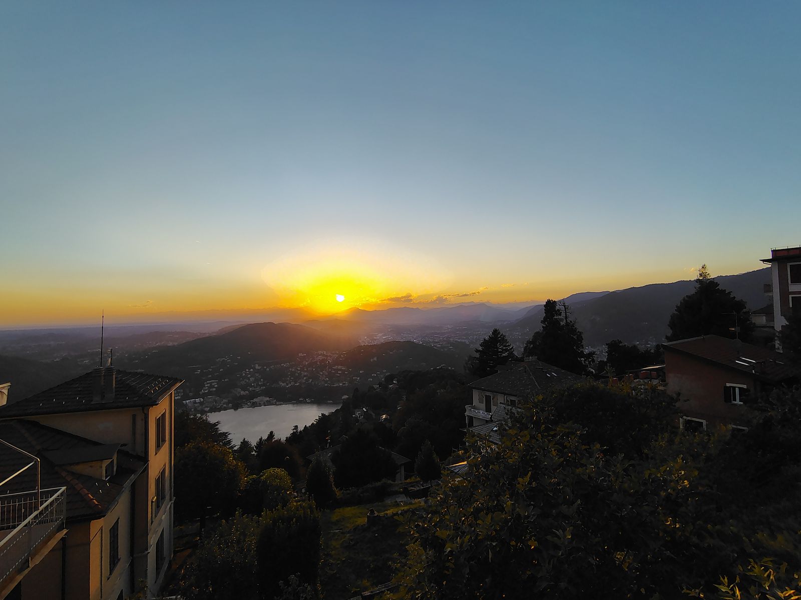 The sun going down behind the far ridge