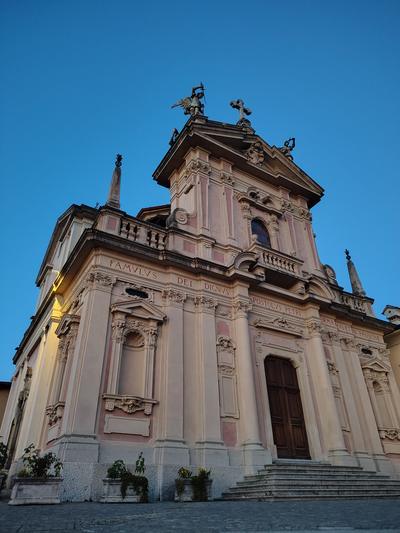 A baroque church lit up after dark