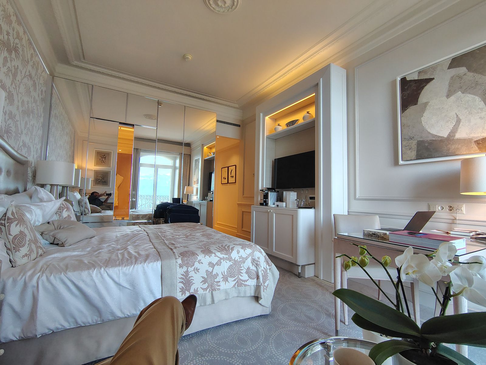 White linen, an orchid, and the terrace door left open — Beau-Rivage Palace