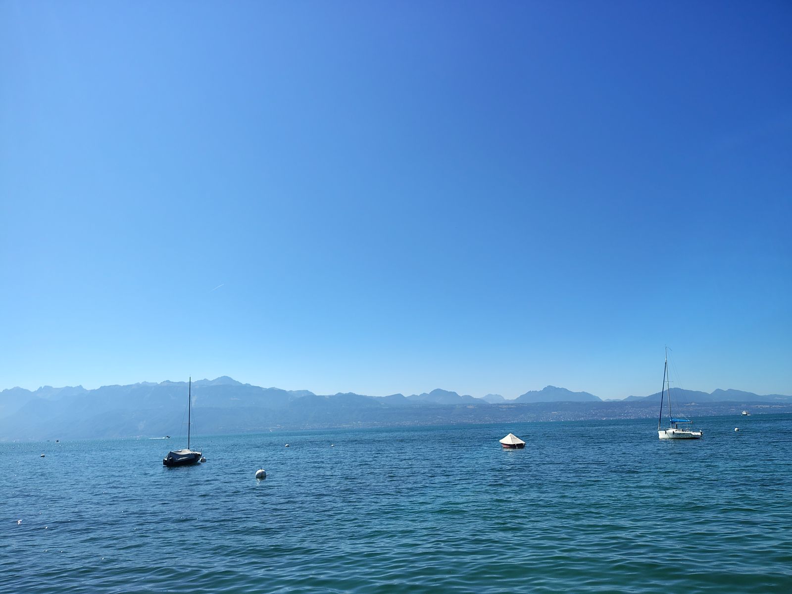 Lake Geneva from the Ouchy shore, the Savoy Alps on the French side