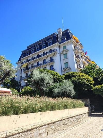 The Beau-Rivage Palace from the quay, every balcony facing the same way