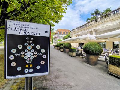 Gruyères advertising itself on the Beau-Rivage terrace — an hour up the line, and worth the day