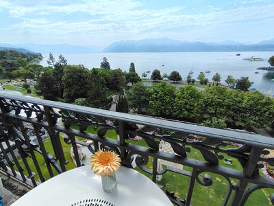 Breakfast on the balcony, Lake Geneva doing the rest