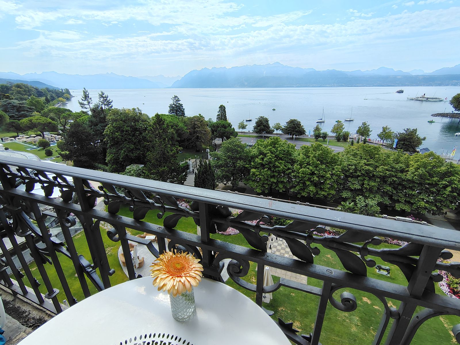 Breakfast on the balcony, Lake Geneva doing the rest