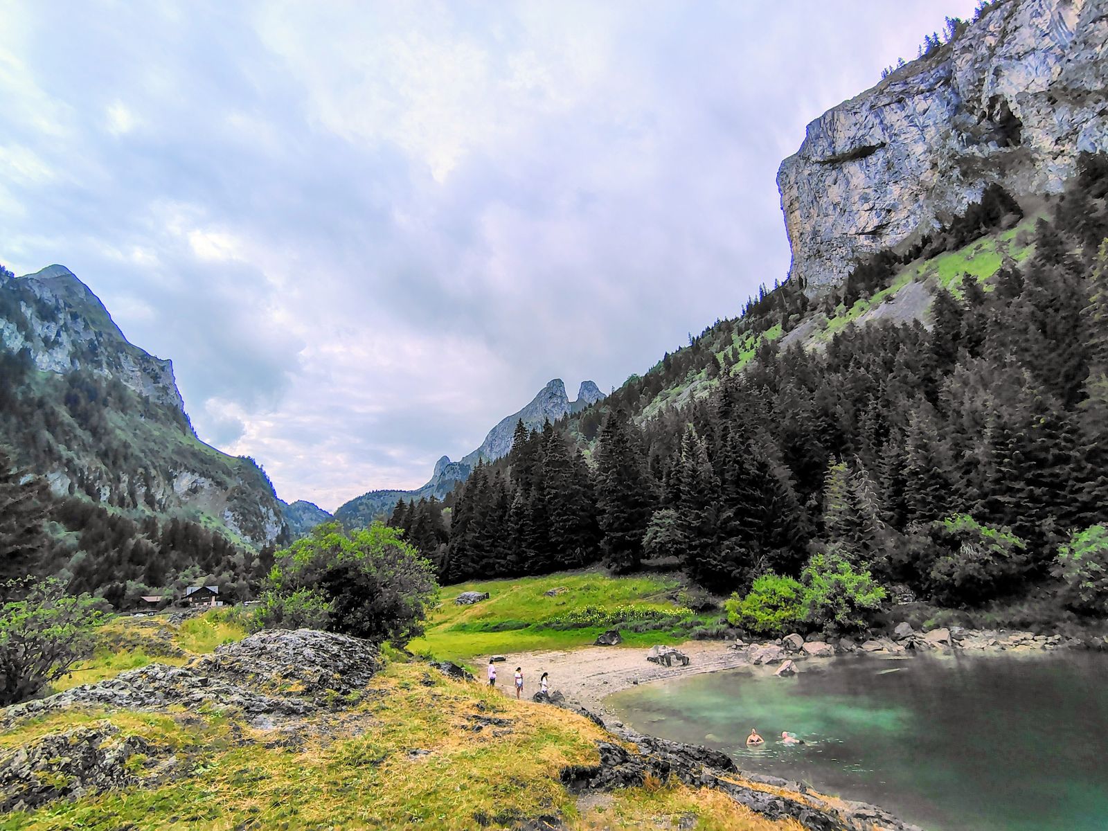 A pre-Alpine lake under limestone cliffs, ninety minutes from the city