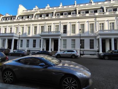 A stucco terrace in Bayswater, an Aston Martin in front <strong>Our own photograph of London, not of the hotel.</strong>