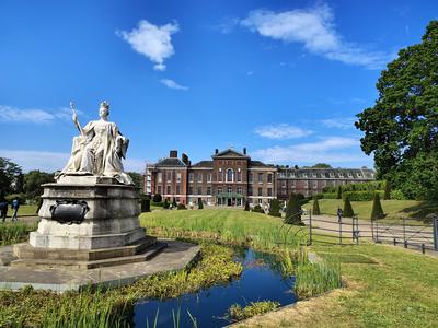 Queen Victoria's statue in front of Kensington Palace on a summer morning