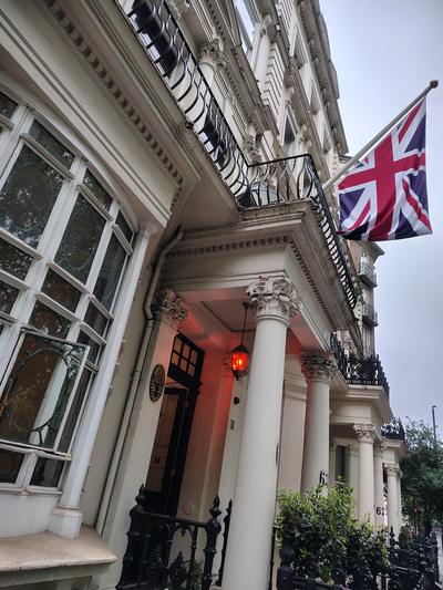 A porticoed Bayswater entrance with the Union flag out