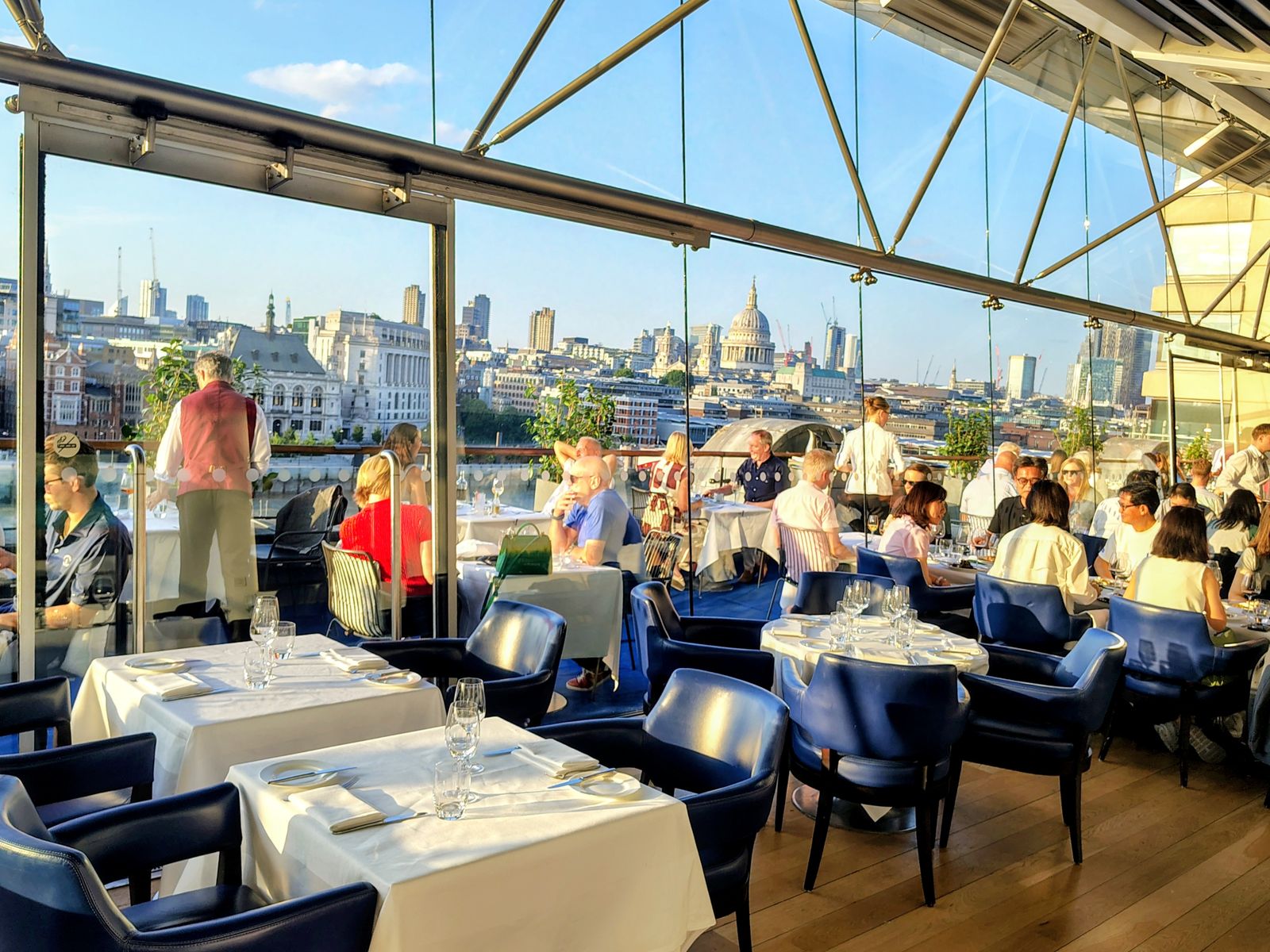 Dinner on a South Bank roof terrace, St Paul's across the water and the light going gold — London