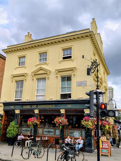 The Earl of Lonsdale pub on Portobello Road, flowers in every basket