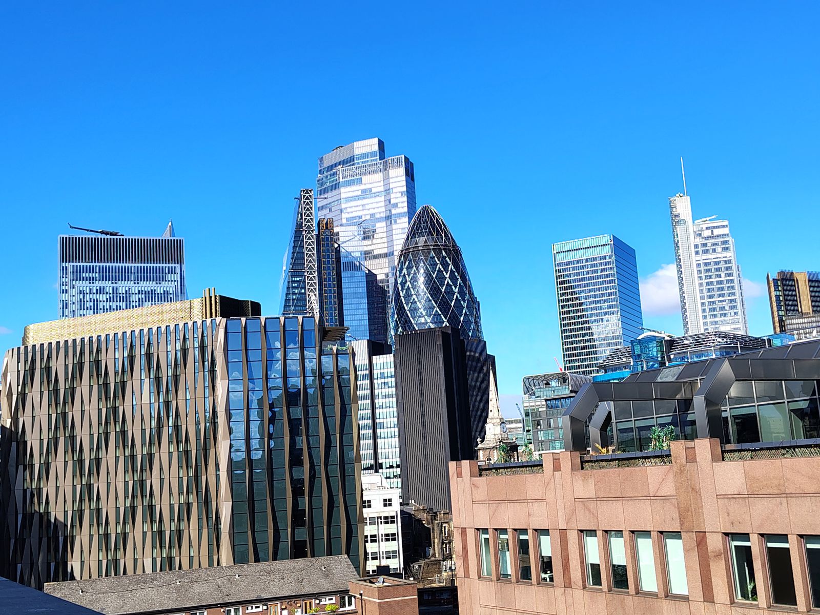 The City skyline from Aldgate on a clear morning - the Gherkin, the Scalpel and their neighbours