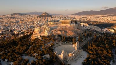 The city spreading out below the hills — Athens
