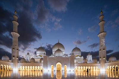 A white mosque under a clouded sky — Dubai