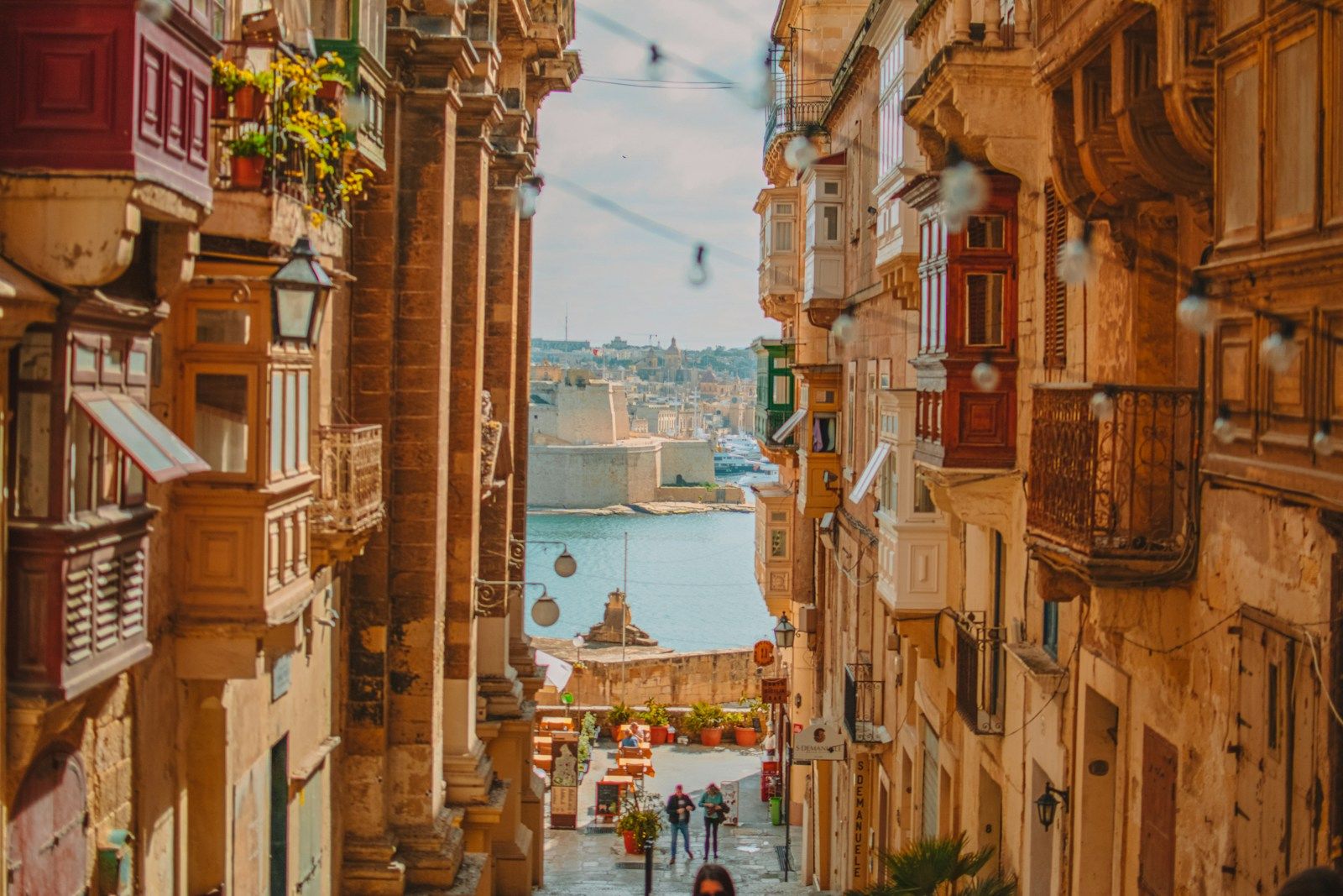 A Valletta street of traditional wooden balconies — Malta